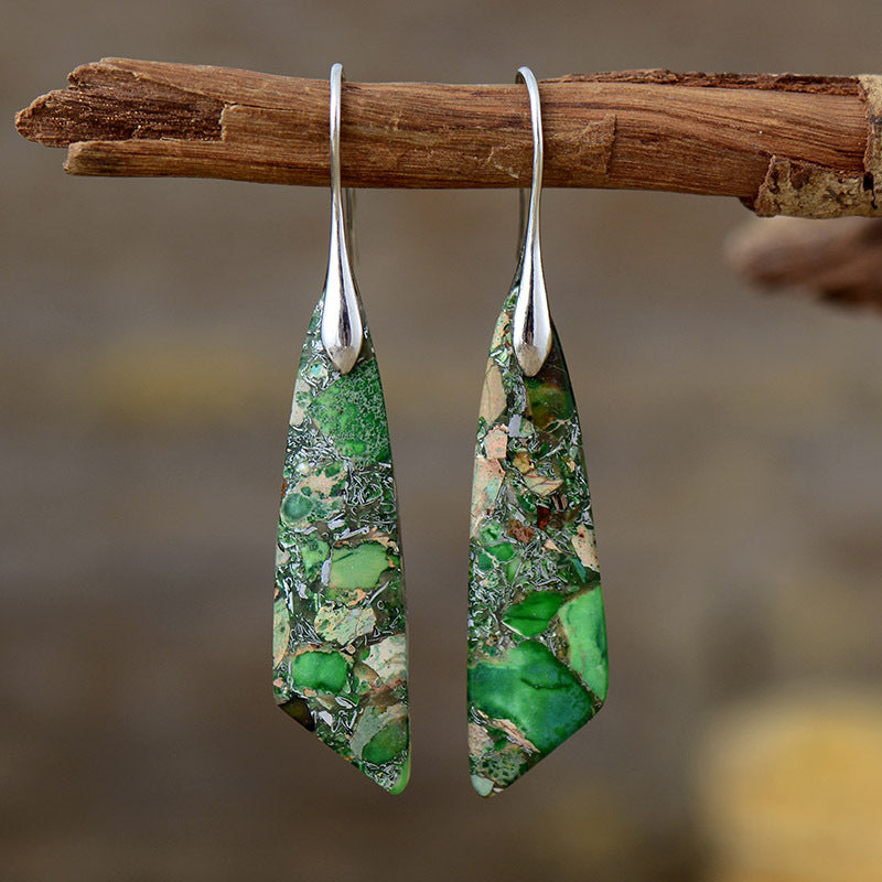 Stylish bohemian fashion statement drop earrings for women, handcrafted with unique artisan details and vibrant colors.