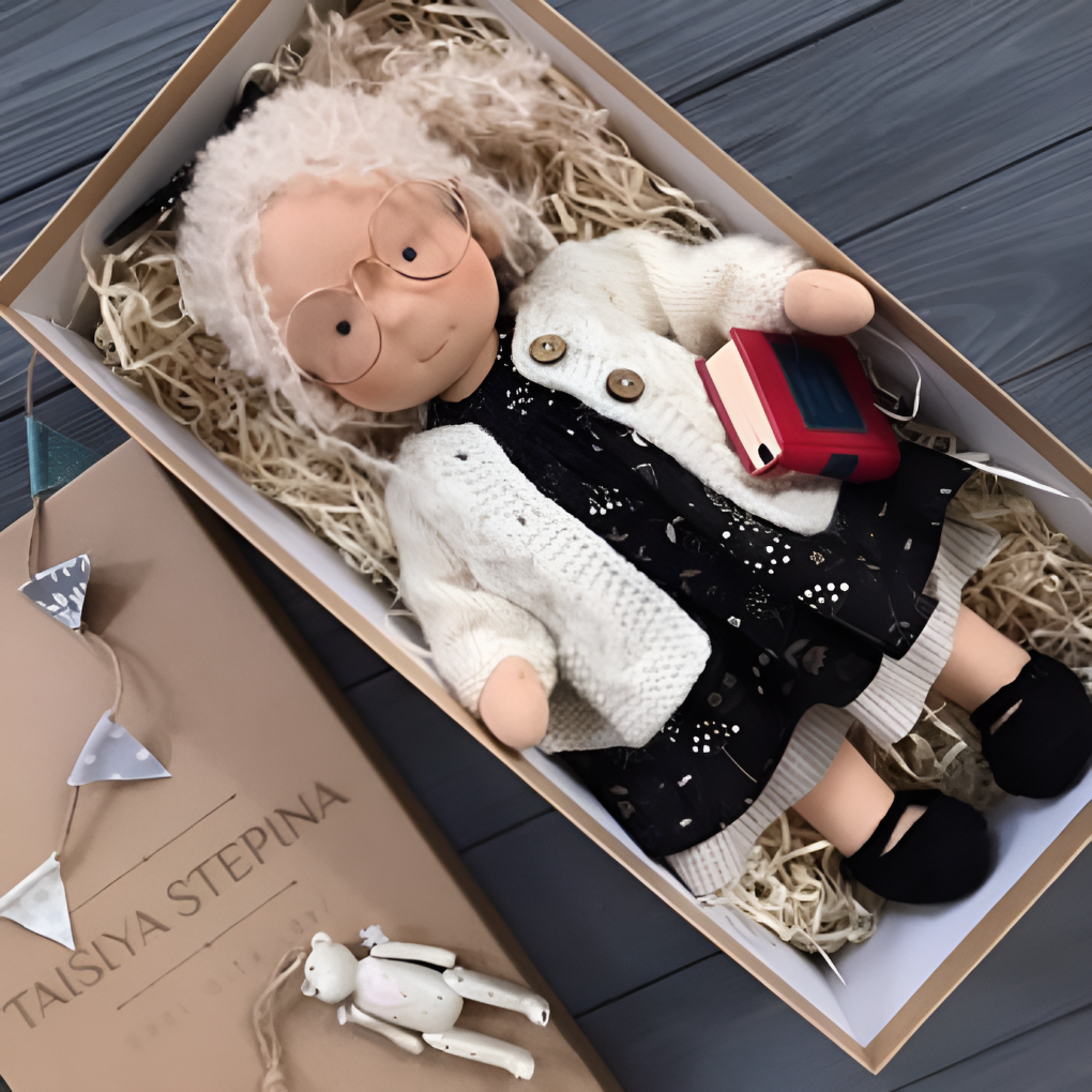Handmade Waldorf cuddly doll for imaginative play, a natural and soft children's toy.