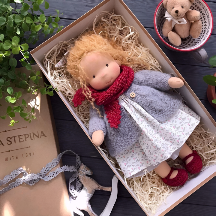 Soft cotton Waldorf doll, encourages imaginative and nurturing play for toddlers.