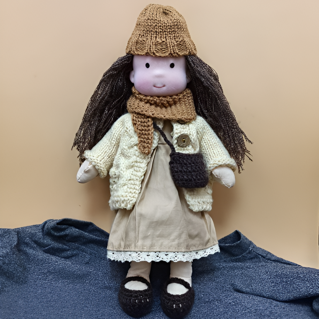 Handmade Waldorf doll, a natural wool toy for cuddly and imaginative children's play.