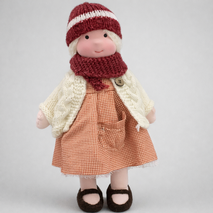 Hypoallergenic Waldorf doll, soft and cuddly, perfect for imaginative children's play.