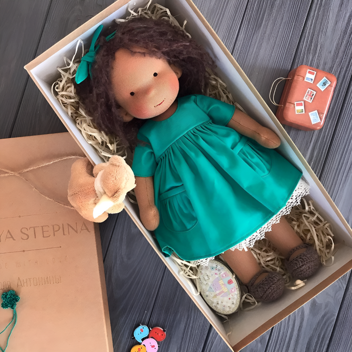 Waldorf natural toy, a handmade cotton and wool doll for nurturing imaginative play.