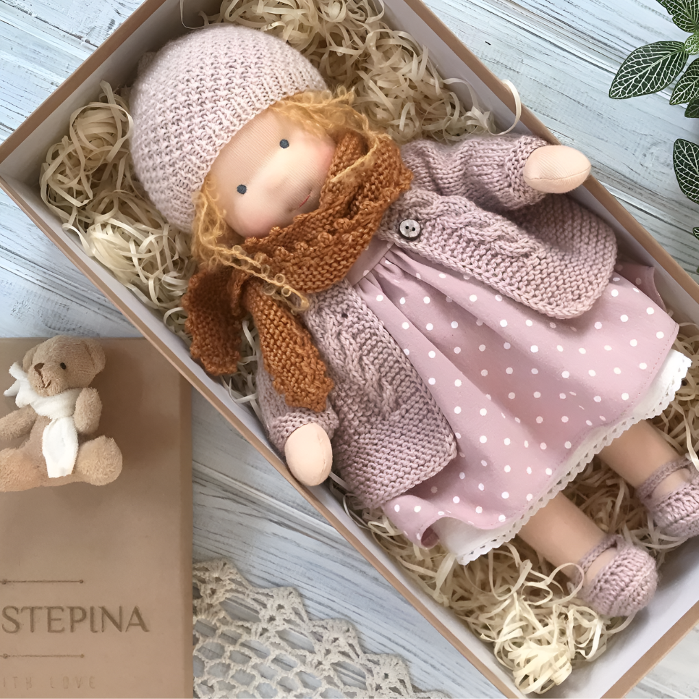 Waldorf cotton doll, soft and cuddly, ideal for imaginative children's play and learning.