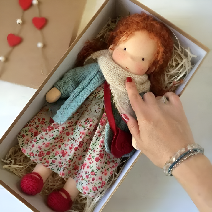 Waldorf soft cotton doll, an imaginative play toy for toddlers, promotes nurturing development.