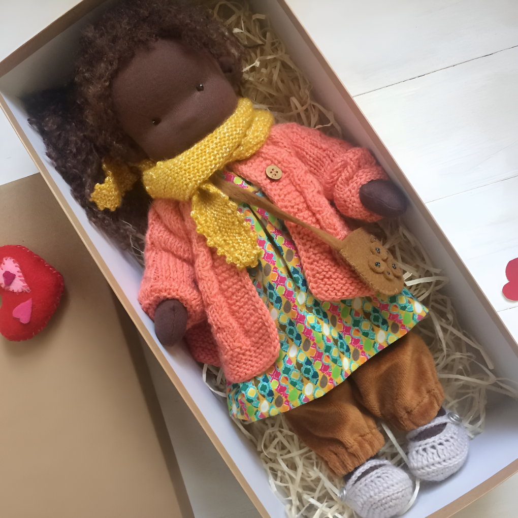 Imaginative play Waldorf doll, a handmade cotton and wool children's toy.