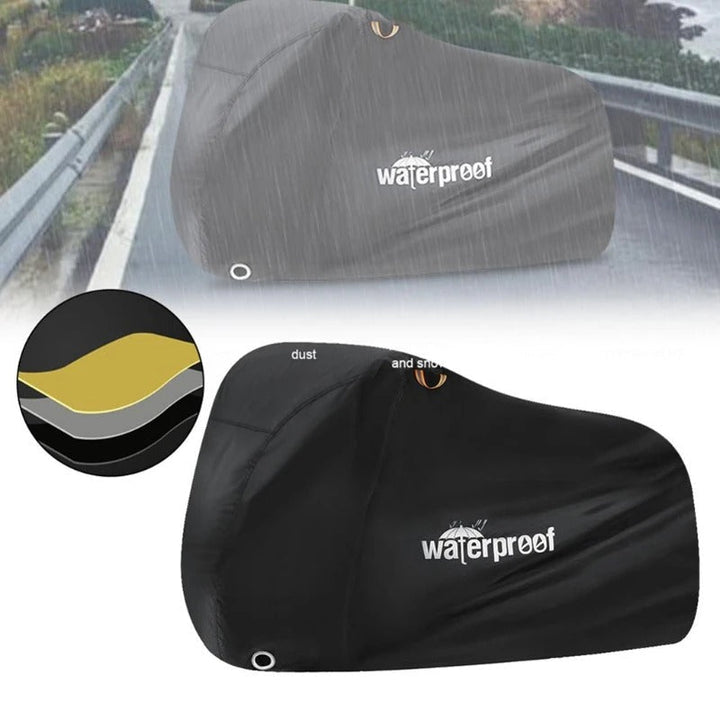 "Heavy-duty waterproof bicycle cover, black and gray, protecting bikes from weather with adjustable straps for secure fit."