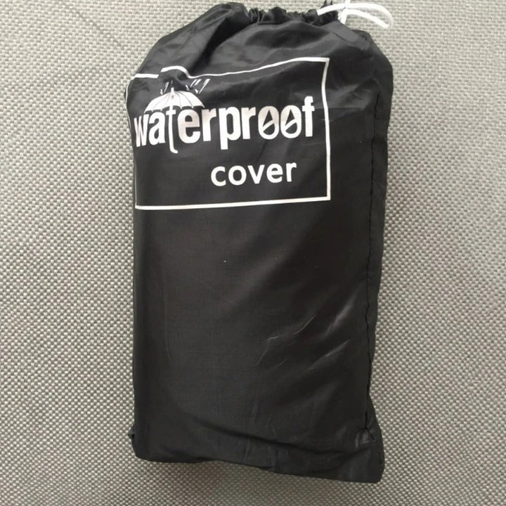 "Heavy-duty waterproof bicycle cover, black and gray, protecting bikes from weather with adjustable straps for secure fit."