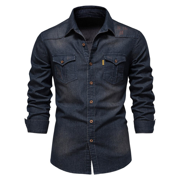Close-up of Hugo men's denim casual button-up shirt. Features long sleeves & quality fabric for everyday style.