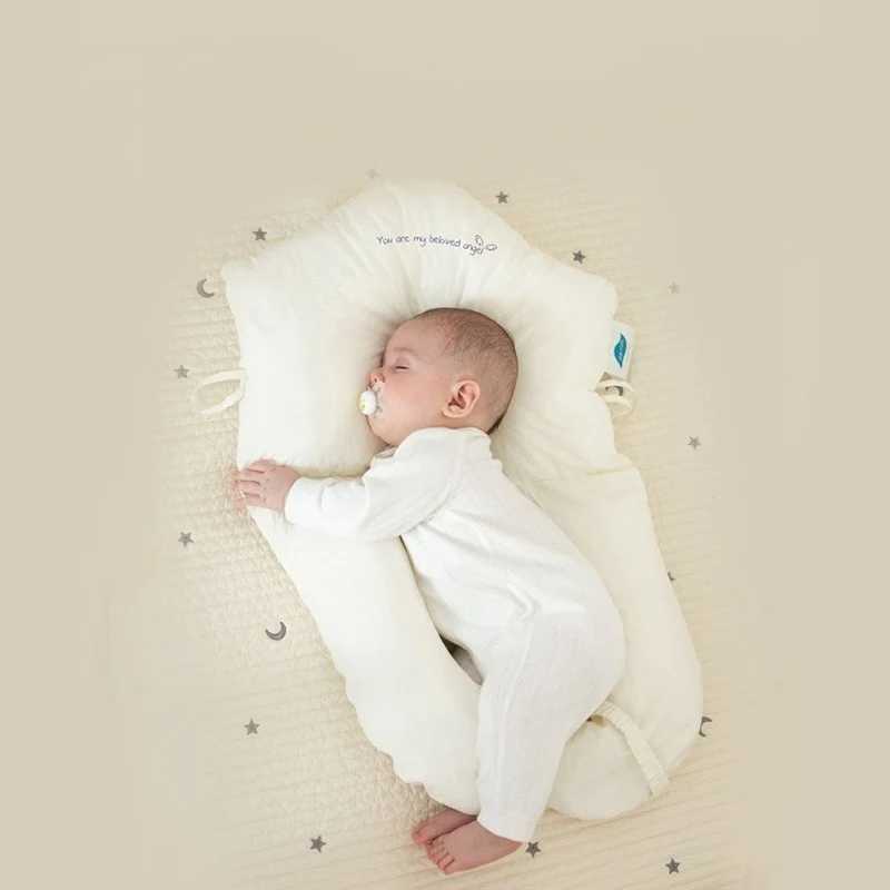 Safe hypoallergenic baby sleep pillow, providing gentle head & neck support for infants to ensure peaceful, healthy rest.