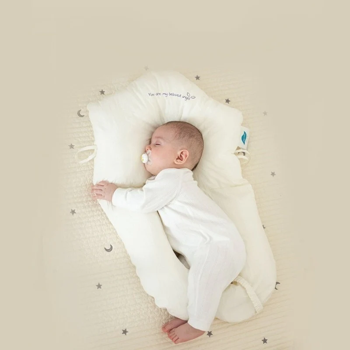 Safe hypoallergenic baby sleep pillow, providing gentle head & neck support for infants to ensure peaceful, healthy rest.