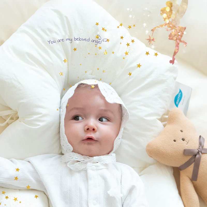 Soft, breathable hypoallergenic infant sleep pillow ensures gentle head support & safe rest for newborns and toddlers.