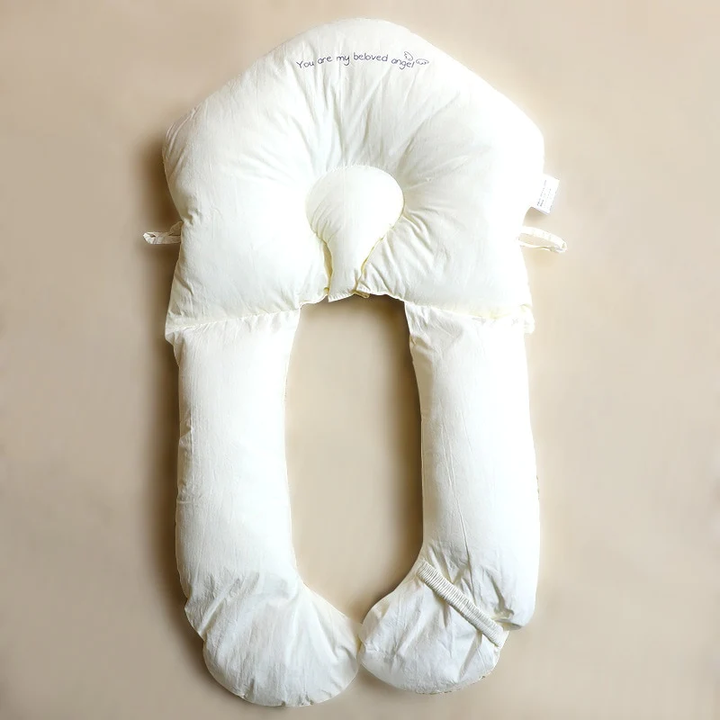 Premium hypoallergenic infant sleep pillow for gentle head & neck support, perfect for safe sleep in baby's nursery bedding.
