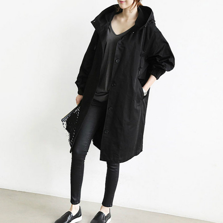 Isabelle Women's long hooded trench coat. Stylish and weatherproof outerwear for fall & spring fashion.