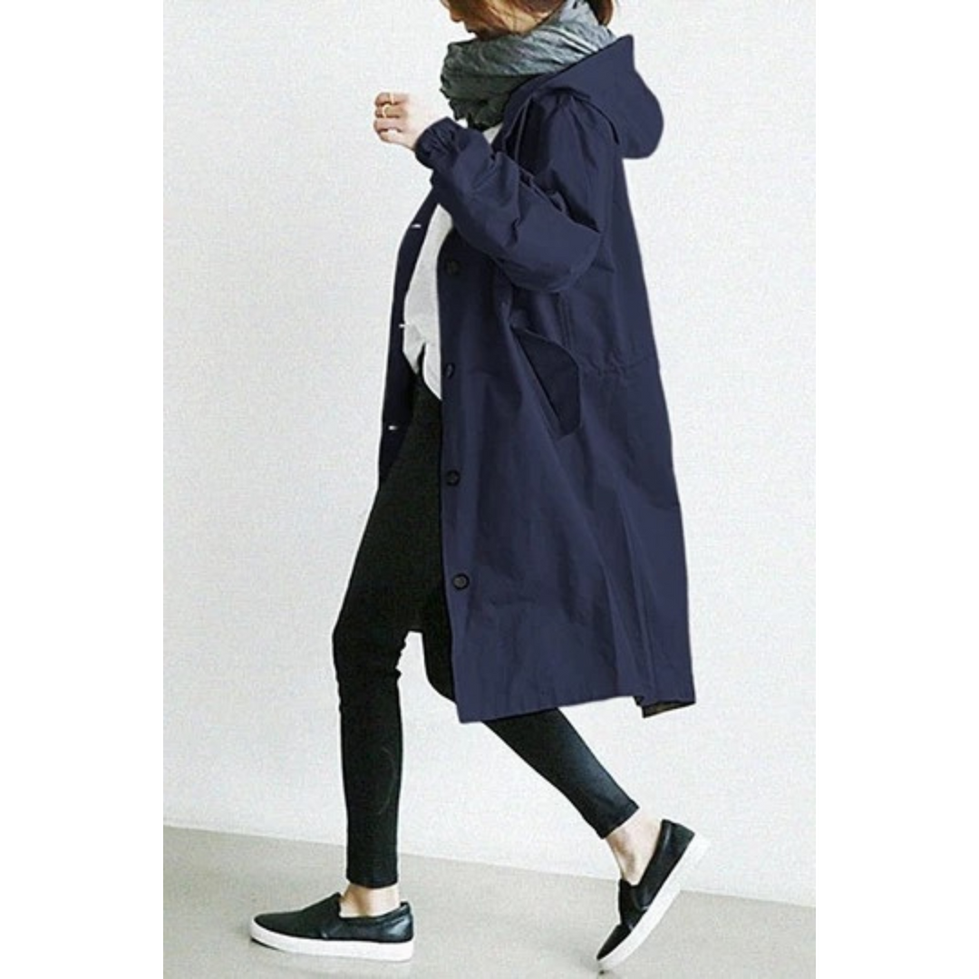 Elegant women's hooded trench coat, perfect for all weather. Long, stylish raincoat for spring & fall.