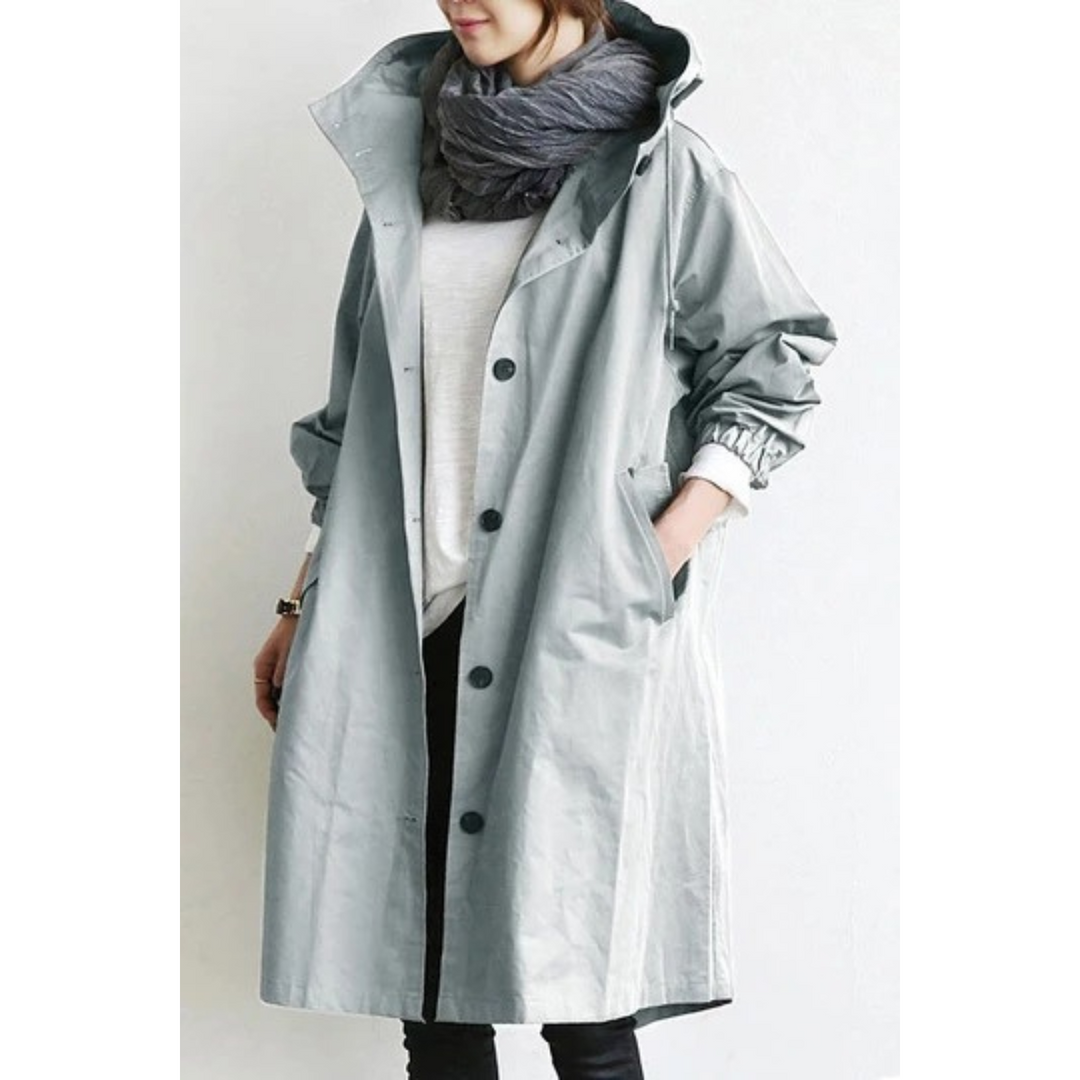 Black Isabelle women's long hooded trench coat, a versatile and chic outerwear piece for all seasons.