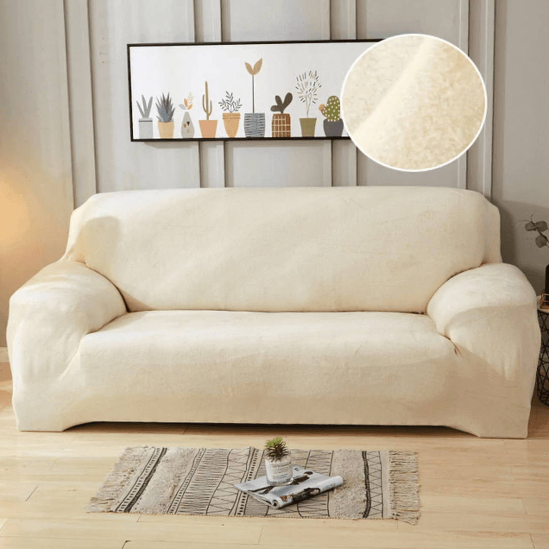 Ivory Plush Sofa Cover showing versatile fit on an L-shaped sofa, enhancing style with soft, luxurious material.