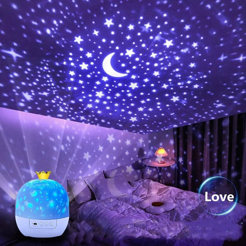 Nursery decor: Star projector night light illuminating a child's room with rotating stars, moon, and ocean wave patterns.