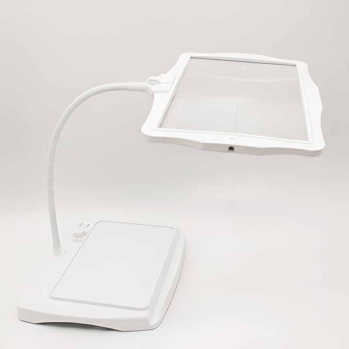 Unisex LED magnifying reading light, perfect for hobbies, crafts & desk work. Adjustable, rechargeable & hands-free.