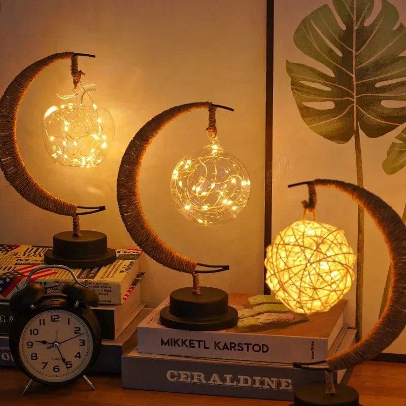 "LED Moon Star Night Light with hemp rope, moon-shaped, emits warm glow, ideal decor for cozy rooms, rustic charm."