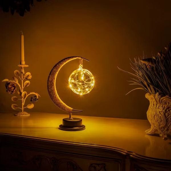 "LED Moon Star Night Light with hemp rope, moon-shaped, emits warm glow, ideal decor for cozy rooms, rustic charm."