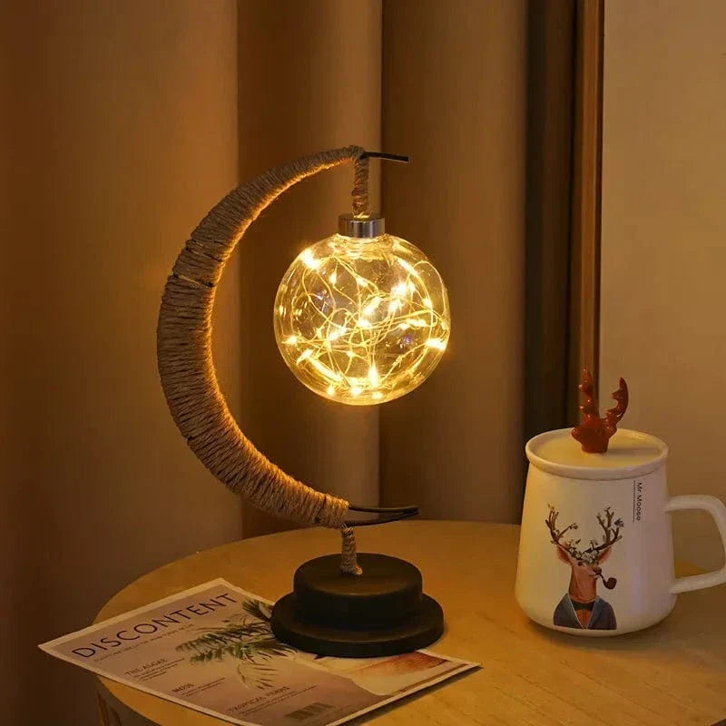 "LED Moon Star Night Light with hemp rope, moon-shaped, emits warm glow, ideal decor for cozy rooms, rustic charm."