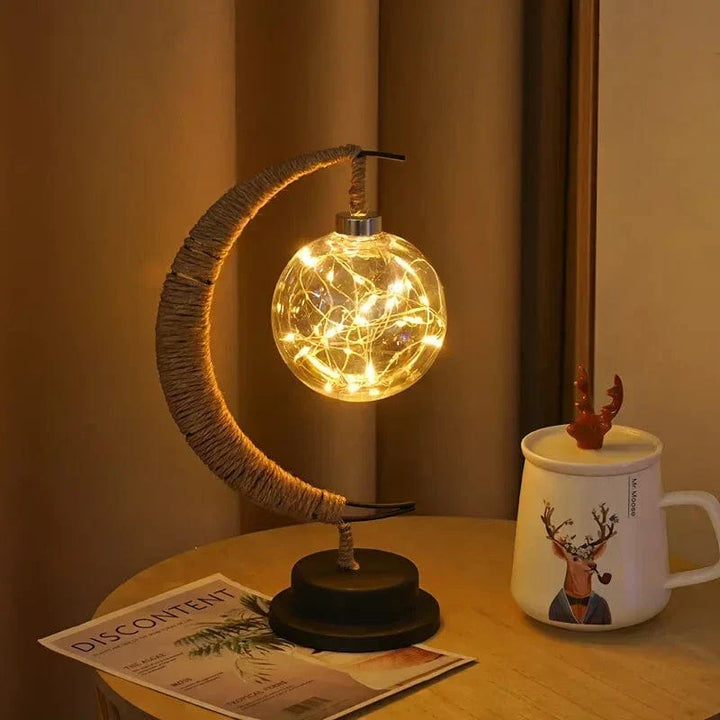 "LED Moon Star Night Light with hemp rope, moon-shaped, emits warm glow, ideal decor for cozy rooms, rustic charm."