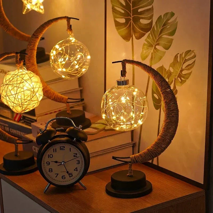 "LED Moon Star Night Light with hemp rope, moon-shaped, emits warm glow, ideal decor for cozy rooms, rustic charm."