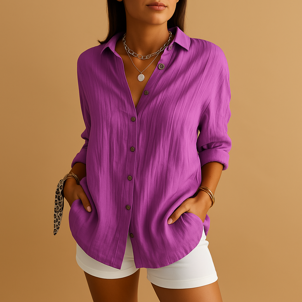 Lightweight women's cotton-linen blouse with long sleeves, relaxed fit, button-up front, ideal for warm-weather comfort.