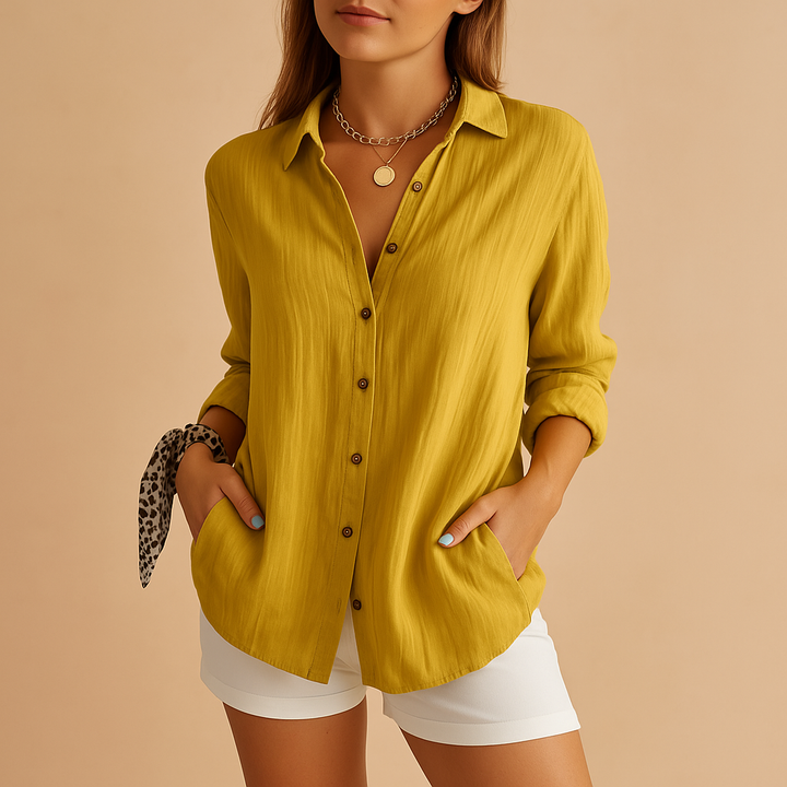 Lightweight women's cotton-linen blouse with long sleeves, relaxed fit, button-up front, ideal for warm-weather comfort.