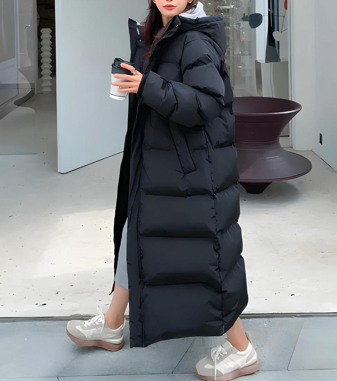 Long women's waterproof & windproof winter parka. Warm, stylish outerwear for cold weather, urban fashion.