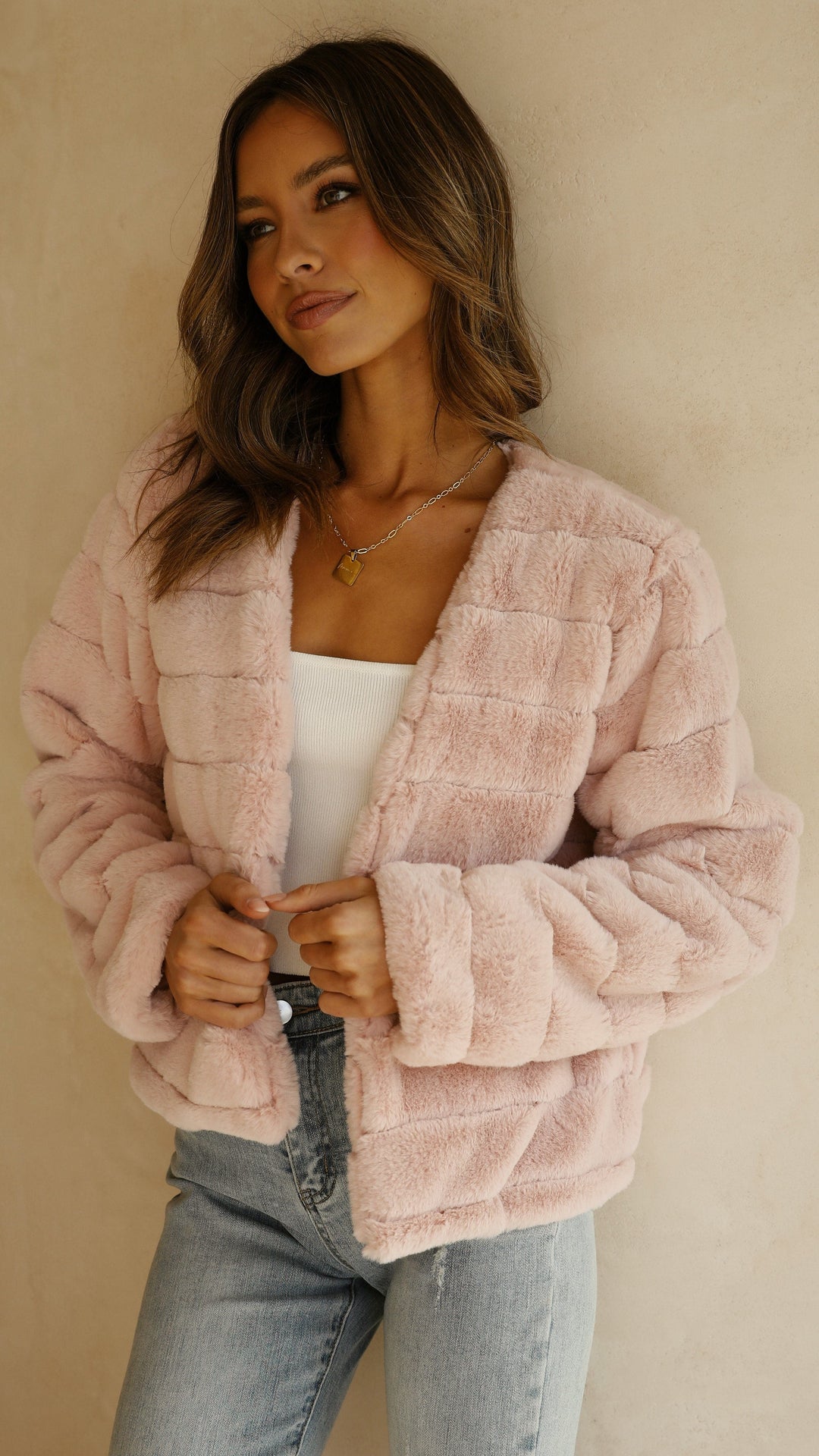 Veloura cropped jacket, close-up of soft texture & elegant women's style.