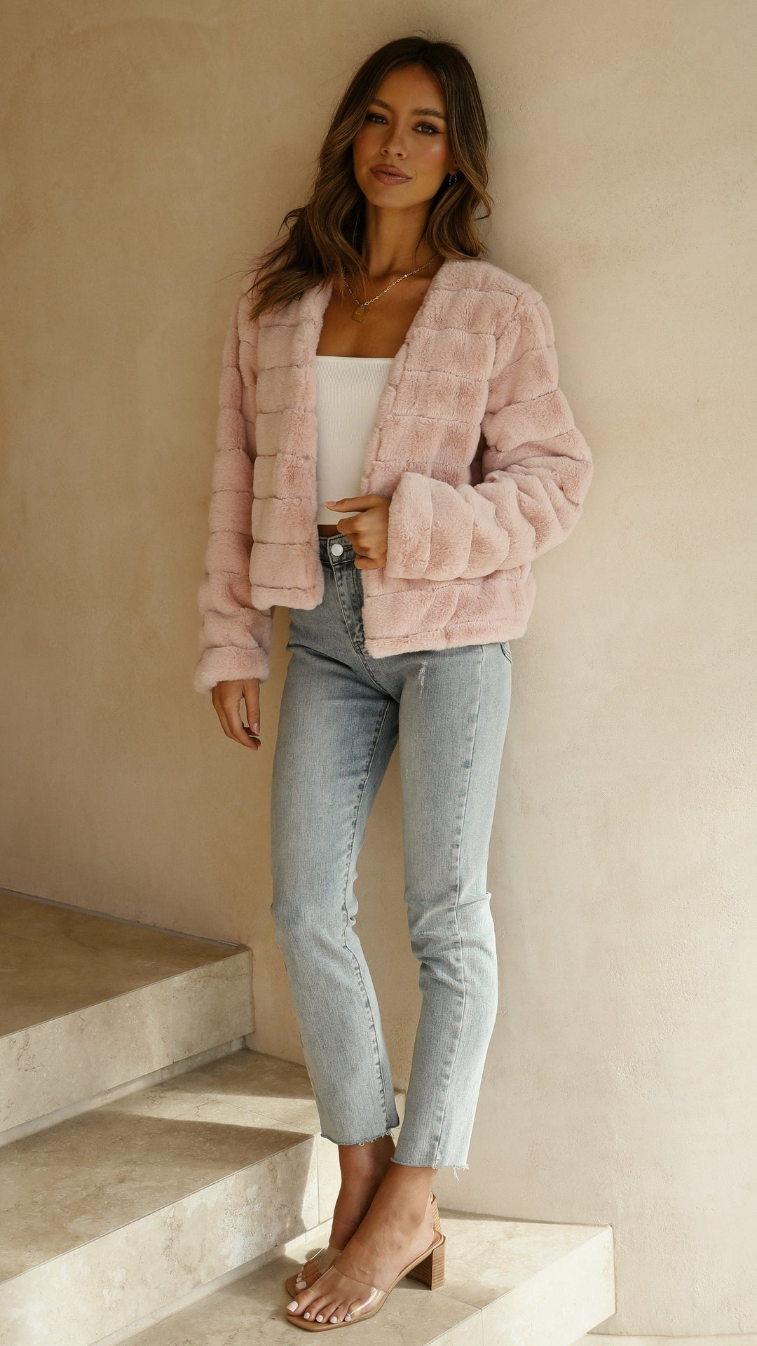 Stylish women's Veloura cropped jacket, perfect for a cozy autumn evening.