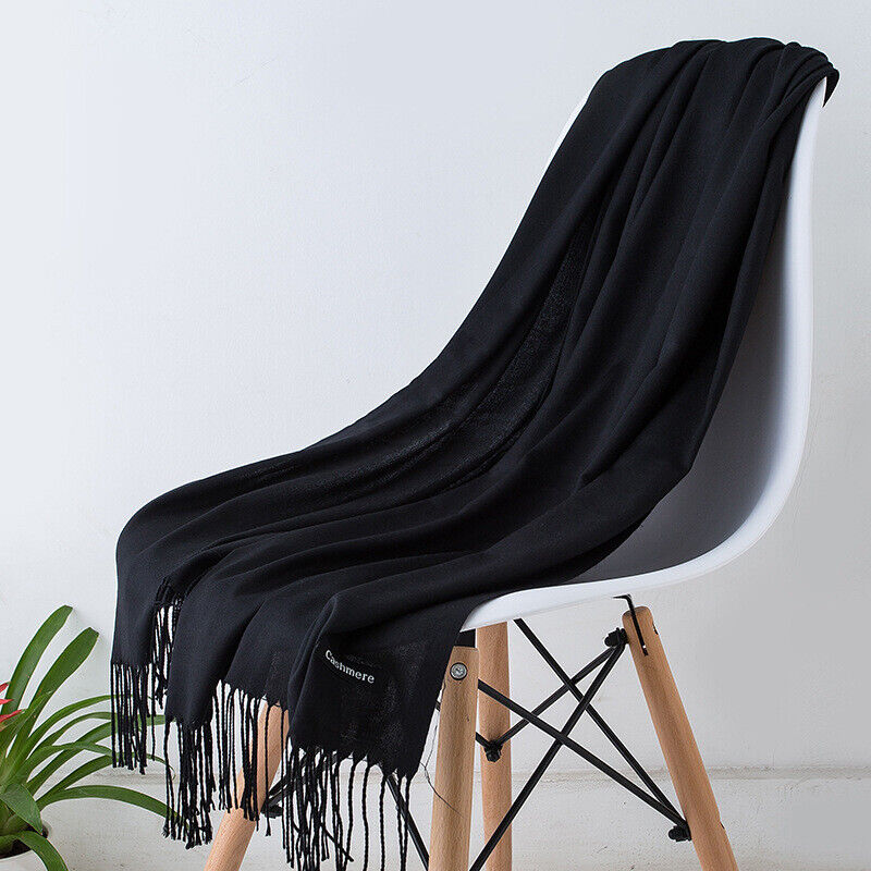 Luxurious Bria cashmere scarf for women. Soft, warm & stylish winter fashion accessory.