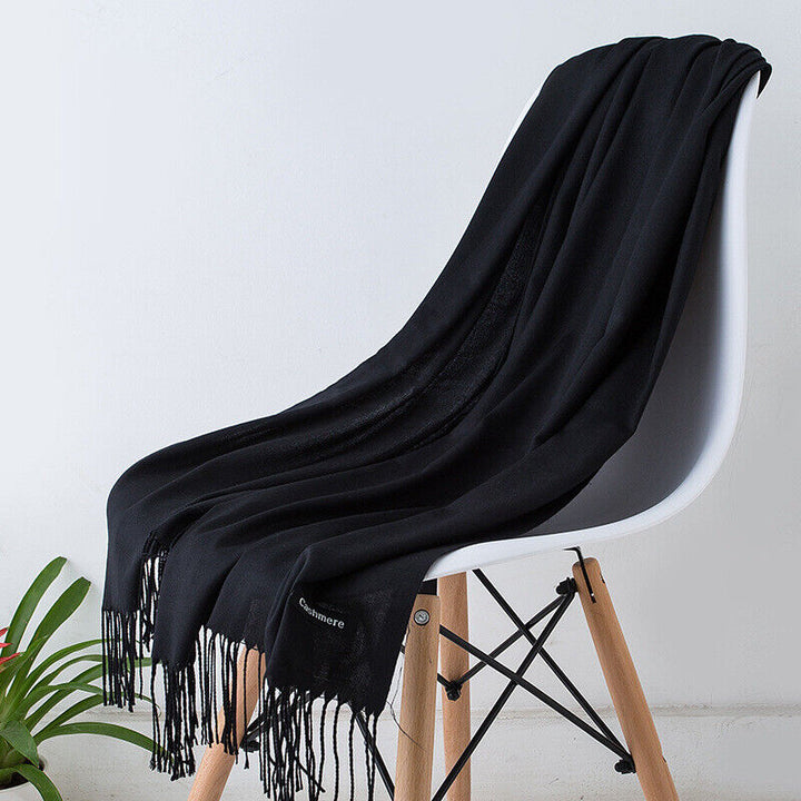 Luxurious Bria cashmere scarf for women. Soft, warm & stylish winter fashion accessory.