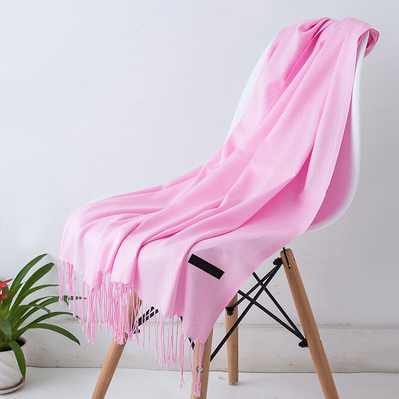 High-quality Bria long cashmere scarf for women. Stylish, soft, and warm fashion accessory.