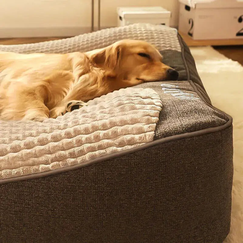 "Luxurious calming washable dog cushion in soft faux fur, available in sizes for all dogs, promotes stress-free relaxation."