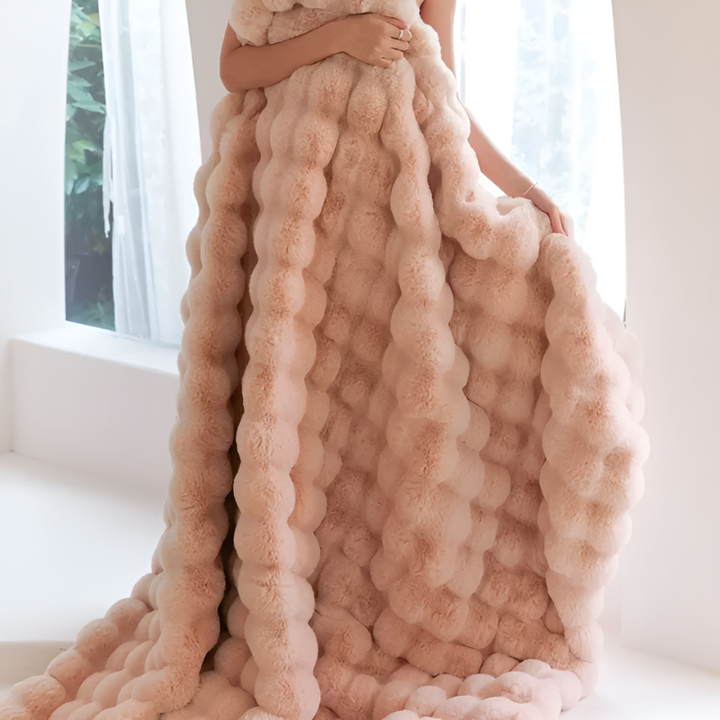 "Luxurious double-sided fleece and faux fur blanket for ultimate warmth, soft texture; ideal bedding or decorative throw."
