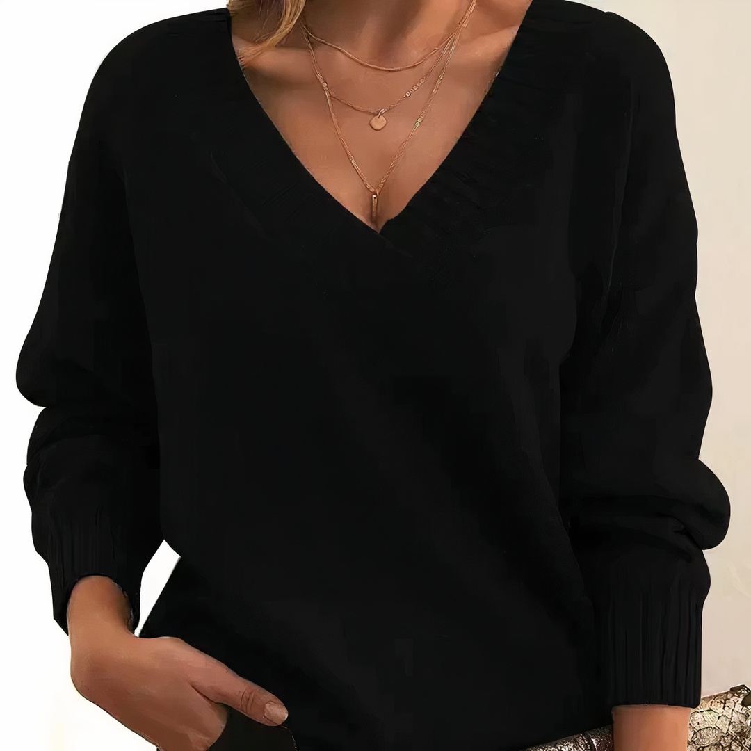 Luxurious women's v-neck sweater, elegant winter style.