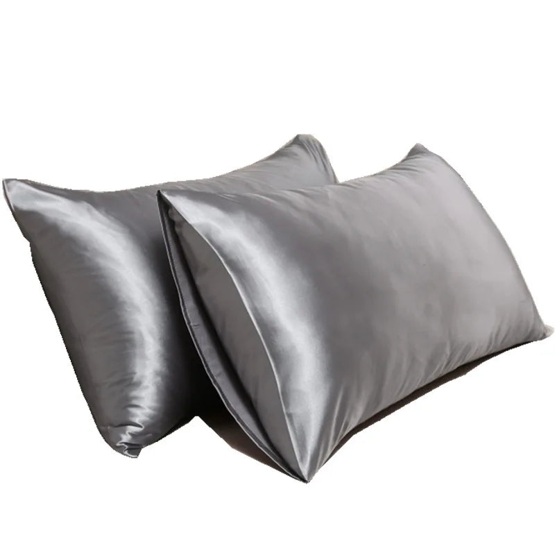 Luxurious mulberry silk pillowcase, unisex, pure silk, close-up of elegant smooth texture enhances skin and hair health.