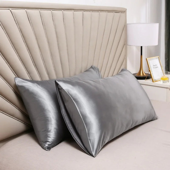 Luxurious mulberry silk pillowcase, unisex, pure silk, close-up of elegant smooth texture enhances skin and hair health.