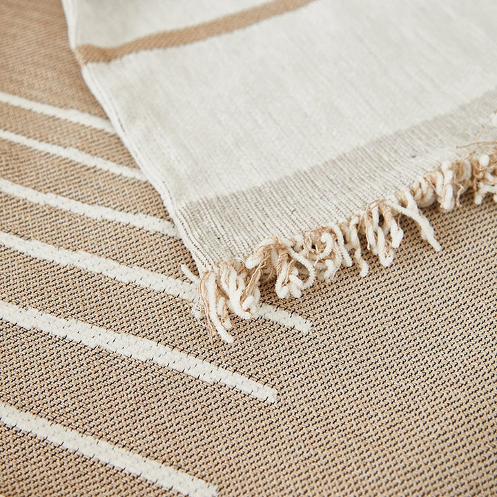 Luxurious sofa throw cover for sectionals, elegantly draped in soft, stretchable fabric, ideal for modern home decor.