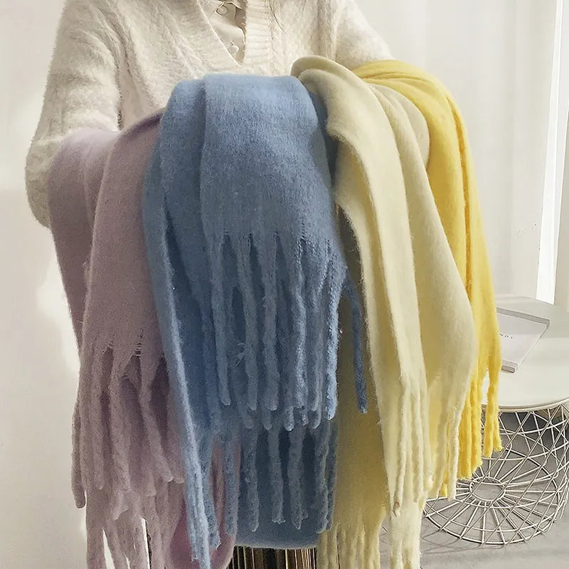 Solid color cashmere fashion scarf, providing luxurious softness and warmth for women in winter.