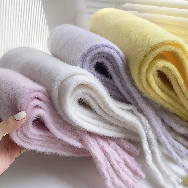 Luxurious women's winter accessory: a warm, soft cashmere scarf for cozy, elegant style.