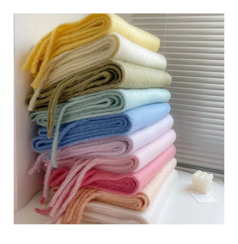 Elegant women's plain cashmere scarf, incredibly soft and warm, essential for winter fashion.