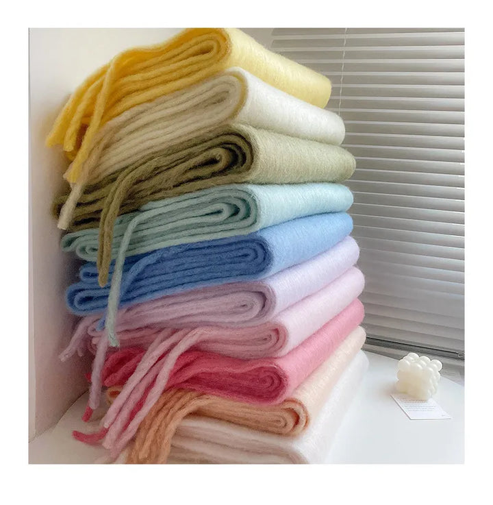 Elegant women's plain cashmere scarf, incredibly soft and warm, essential for winter fashion.
