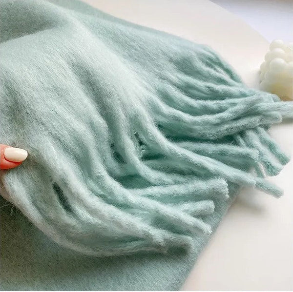 Chic women's cashmere winter scarf, providing ultimate softness and warmth. A versatile solid color accessory.