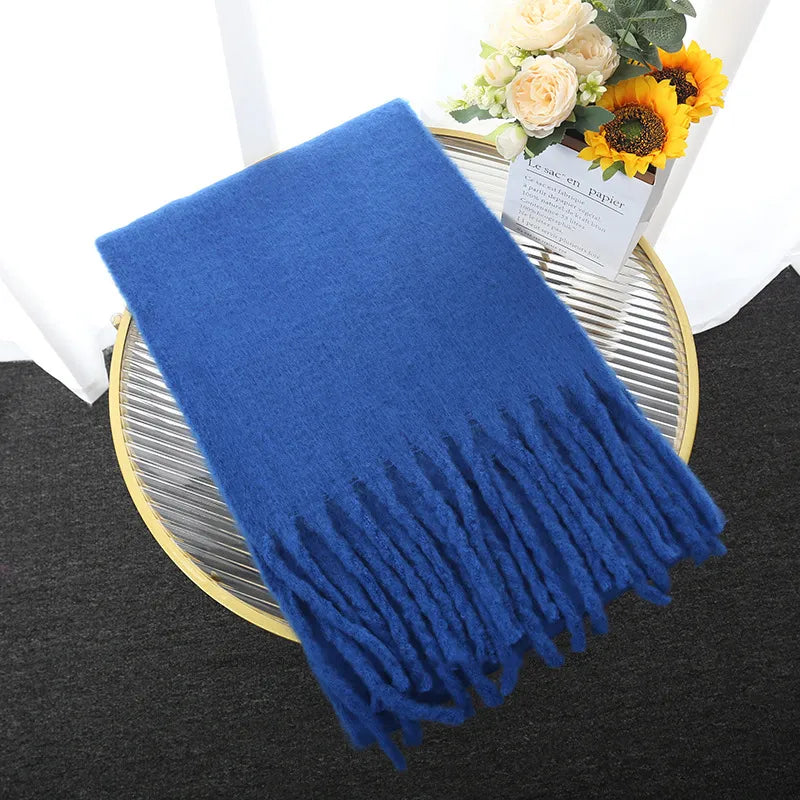 Cozy and luxurious women's cashmere scarf, ideal for adding warmth and style to any winter outfit.
