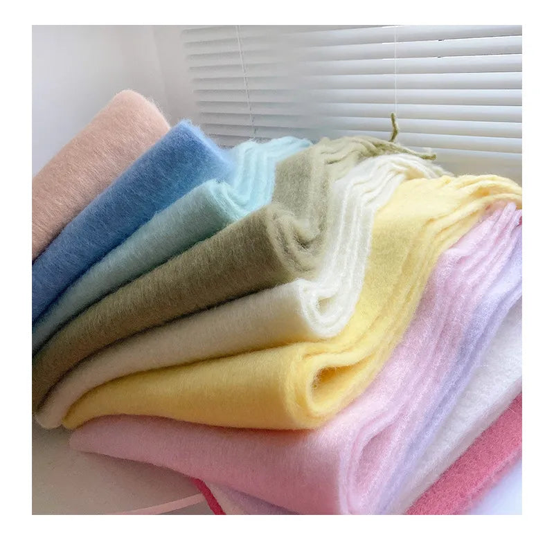 Stylish women's winter scarf, crafted from soft, warm cashmere for comfort & elegance.