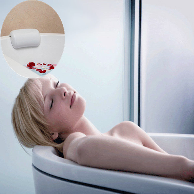 Luxurious white bath cushion pillow for ultimate spa comfort. Ergonomic head & neck support for relaxation.
