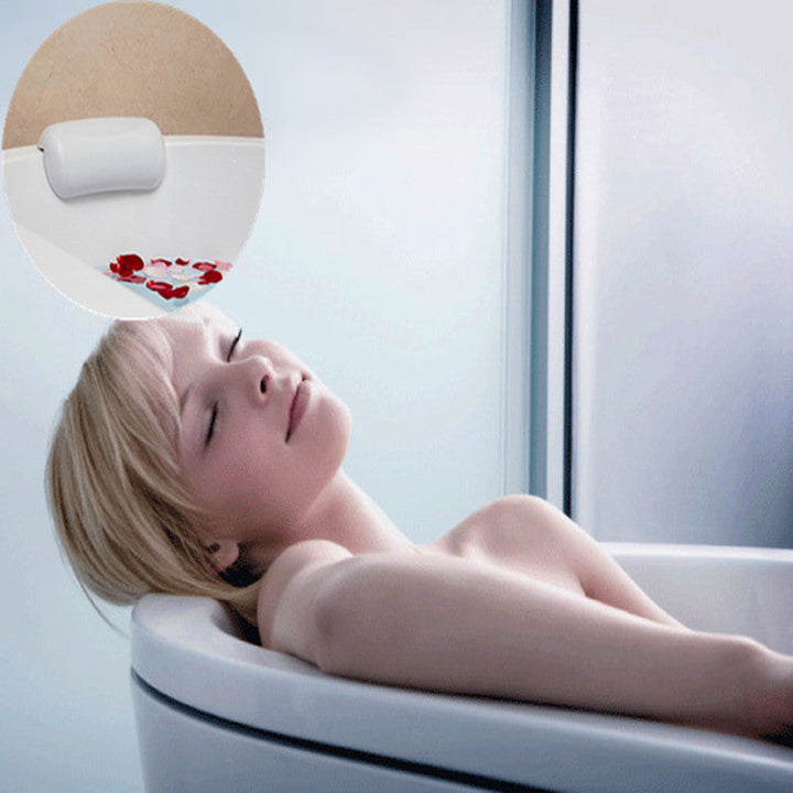 Luxurious white bath cushion pillow for ultimate spa comfort. Ergonomic head & neck support for relaxation.